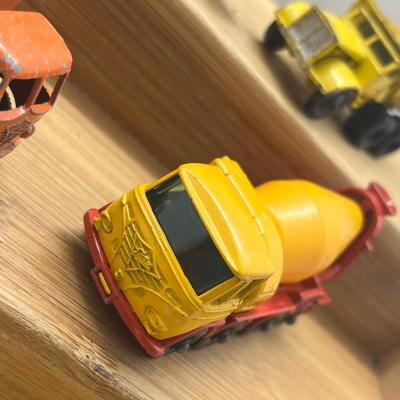 LOT 106: Vintage Lesney Matchbox Construction Vehicles - Caterpillar Bulldozer, Foden Cement Mixer, Foden Concrete Truck and More