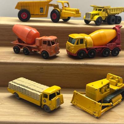 LOT 106: Vintage Lesney Matchbox Construction Vehicles - Caterpillar Bulldozer, Foden Cement Mixer, Foden Concrete Truck and More