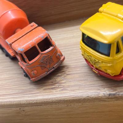 LOT 106: Vintage Lesney Matchbox Construction Vehicles - Caterpillar Bulldozer, Foden Cement Mixer, Foden Concrete Truck and More