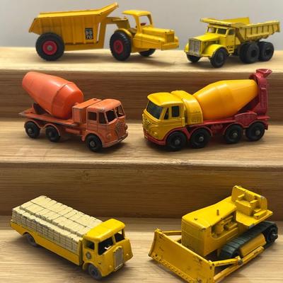 LOT 106: Vintage Lesney Matchbox Construction Vehicles - Caterpillar Bulldozer, Foden Cement Mixer, Foden Concrete Truck and More
