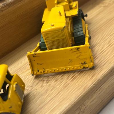 LOT 106: Vintage Lesney Matchbox Construction Vehicles - Caterpillar Bulldozer, Foden Cement Mixer, Foden Concrete Truck and More