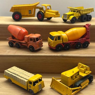 LOT 106: Vintage Lesney Matchbox Construction Vehicles - Caterpillar Bulldozer, Foden Cement Mixer, Foden Concrete Truck and More