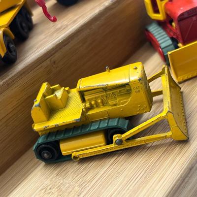 LOT 112: Vintage Lesney Matchbox Construction Vehicles - Crane Truck, Caterpillar Bulldozer, Mack Dump Truck and More
