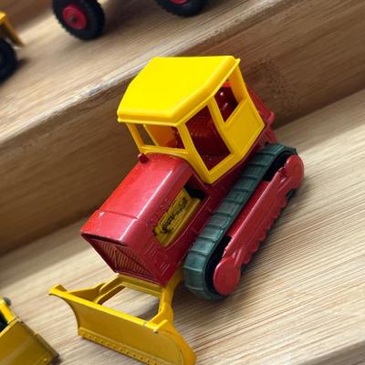 LOT 112: Vintage Lesney Matchbox Construction Vehicles - Crane Truck, Caterpillar Bulldozer, Mack Dump Truck and More