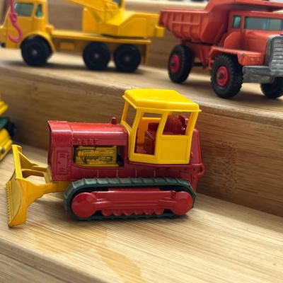 LOT 112: Vintage Lesney Matchbox Construction Vehicles - Crane Truck, Caterpillar Bulldozer, Mack Dump Truck and More