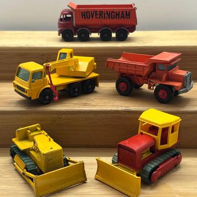 LOT 112: Vintage Lesney Matchbox Construction Vehicles - Crane Truck, Caterpillar Bulldozer, Mack Dump Truck and More