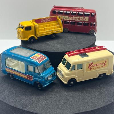 LOT 121: Vintage Lesney Vehicles - Commer Ice Cream Canteen, Karrier Bantam 2 Ton, TV Service Van, London Trolleybus