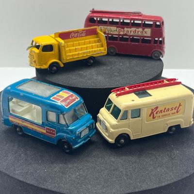 LOT 121: Vintage Lesney Vehicles - Commer Ice Cream Canteen, Karrier Bantam 2 Ton, TV Service Van, London Trolleybus