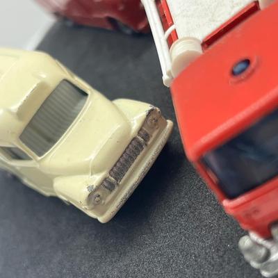 LOT 138: Vintage Lesney Matchbox Vehicles - Lomas Ambulance, Fire Pumper Truck, Ford Galaxie, Merryweather Marquis Series III and Foamite...