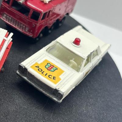 LOT 138: Vintage Lesney Matchbox Vehicles - Lomas Ambulance, Fire Pumper Truck, Ford Galaxie, Merryweather Marquis Series III and Foamite...