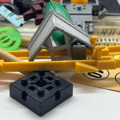 LOT 148: Miscellaneous Vintage Toy Car Parts and Pieces