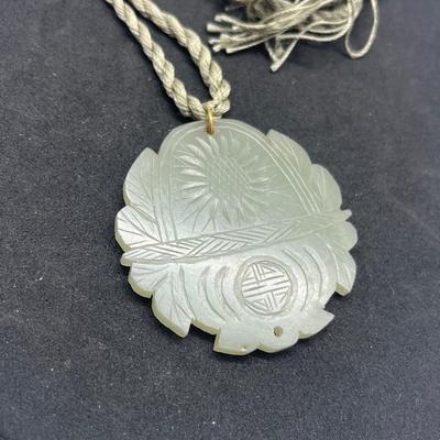 LOT 150: Vintage Certified Jade Pendant on Rope with Floral Case