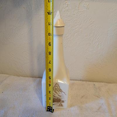 Sale Photo Thumbnail #496: Milk glass oil bottle on liqueur bottle
