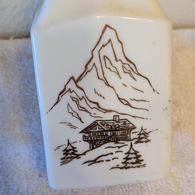 Sale Photo Thumbnail #500: Milk glass oil bottle on liqueur bottle