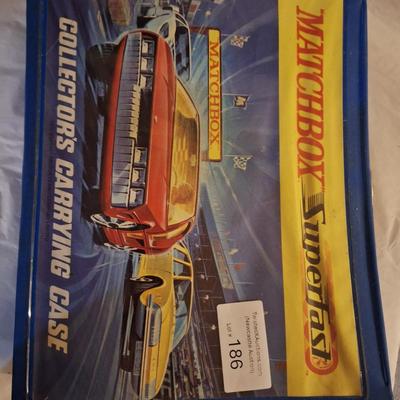 Sale Photo Thumbnail #648: This is a good gift for a  car collector, these are the toy pocket cars made by Lesney before matchbox was bought by Mattel when they were manufactured in England.   Some of the cars in this are probably worth more than the carrier to the right person.