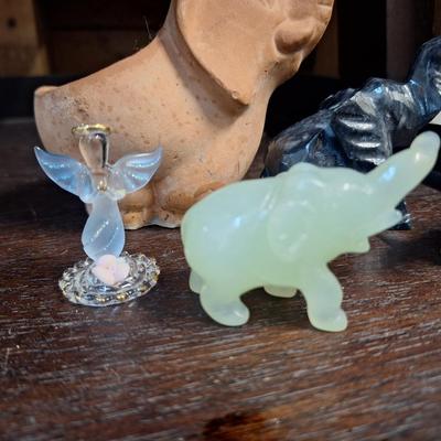 Sale Photo Thumbnail #938: small elephant- stone carved and pottery.