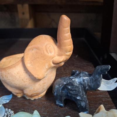 Sale Photo Thumbnail #940: small elephant- stone carved and pottery.