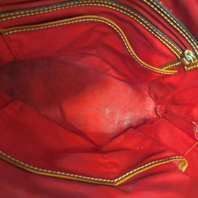 Sale Photo Thumbnail #961: the inside is dirty and on the outside there is small spots that look like someone spilled or smeared a tough of gold glitter paint.  We don't think it's original but weren't sure so we didn't try cleaning it off other than to wipe with a leather wipe.  