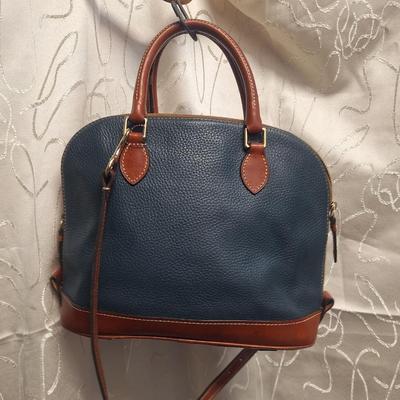 Sale Photo Thumbnail #959: the inside is dirty and on the outside there is small spots that look like someone spilled or smeared a tough of gold glitter paint.  We don't think it's original but weren't sure so we didn't try cleaning it off other than to wipe with a leather wipe.  