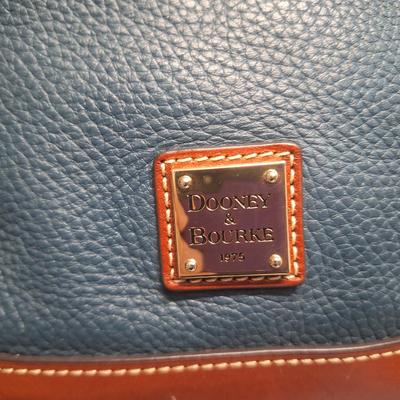 Sale Photo Thumbnail #957: the inside is dirty and on the outside there is small spots that look like someone spilled or smeared a tough of gold glitter paint.  We don't think it's original but weren't sure so we didn't try cleaning it off other than to wipe with a leather wipe.  