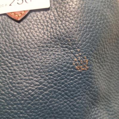 Sale Photo Thumbnail #958: the inside is dirty and on the outside there is small spots that look like someone spilled or smeared a tough of gold glitter paint.  We don't think it's original but weren't sure so we didn't try cleaning it off other than to wipe with a leather wipe.  