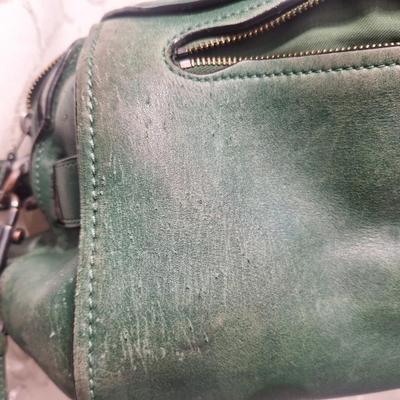 Sale Photo Thumbnail #966: it has been well used and has some rough spots that might clean up with a good leather conditioner.  Please see all photos.