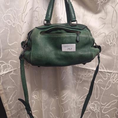 Sale Photo Thumbnail #974: it has been well used and has some rough spots that might clean up with a good leather conditioner.  Please see all photos.