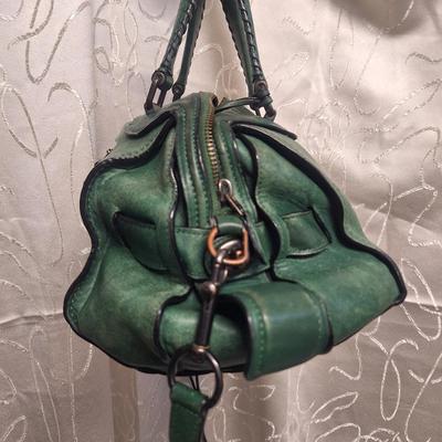 Sale Photo Thumbnail #968: it has been well used and has some rough spots that might clean up with a good leather conditioner.  Please see all photos.