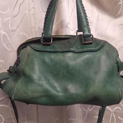 Sale Photo Thumbnail #969: it has been well used and has some rough spots that might clean up with a good leather conditioner.  Please see all photos.