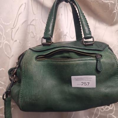 Sale Photo Thumbnail #965: it has been well used and has some rough spots that might clean up with a good leather conditioner.  Please see all photos.