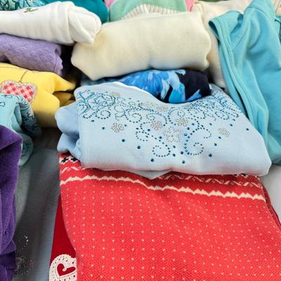 Sale Photo Thumbnail #102: Moderate designer brands, size Med in worn condition. 2 fleece vests.