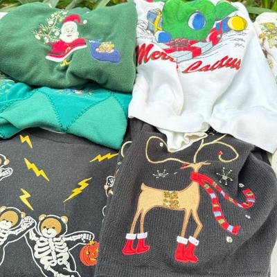 Sale Photo Thumbnail #107: Moderate designer brands, size Med in worn condition. 2 fleece vests.