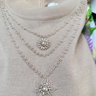 Sale Photo Thumbnail #106: Moderate designer brands, size Med in worn condition. 2 fleece vests.