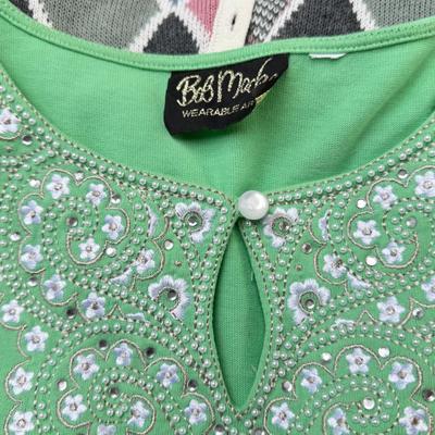 Sale Photo Thumbnail #97: Moderate designer brands, size Med in worn condition. 2 fleece vests.