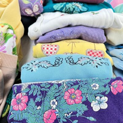 Sale Photo Thumbnail #101: Moderate designer brands, size Med in worn condition. 2 fleece vests.