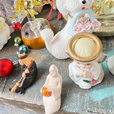 Sale Photo Thumbnail #153: Dolls, praying, wedding Teddy bear, Large porcelain angel, dog figurines, Betty Boop, Mickey Mouse. New Lenox set in box, 3 Royal Dalton porcelain flower pieces in good condition. Perpetual clock, with glass dome, untested needs new battery, but all there