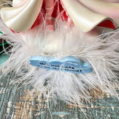 Sale Photo Thumbnail #163: Dolls, praying, wedding Teddy bear, Large porcelain angel, dog figurines, Betty Boop, Mickey Mouse. New Lenox set in box, 3 Royal Dalton porcelain flower pieces in good condition. Perpetual clock, with glass dome, untested needs new battery, but all there