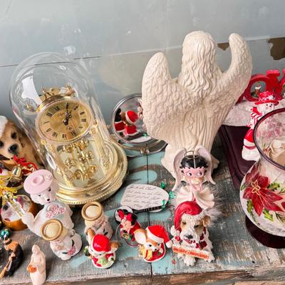 Sale Photo Thumbnail #162: Dolls, praying, wedding Teddy bear, Large porcelain angel, dog figurines, Betty Boop, Mickey Mouse. New Lenox set in box, 3 Royal Dalton porcelain flower pieces in good condition. Perpetual clock, with glass dome, untested needs new battery, but all there