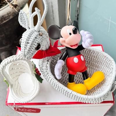 Sale Photo Thumbnail #150: Dolls, praying, wedding Teddy bear, Large porcelain angel, dog figurines, Betty Boop, Mickey Mouse. New Lenox set in box, 3 Royal Dalton porcelain flower pieces in good condition. Perpetual clock, with glass dome, untested needs new battery, but all there