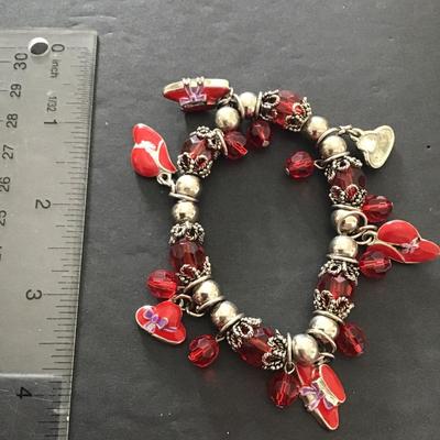 Sale Photo Thumbnail #18: Red hat fashion, stretchy bracelet. Please see attached photos.