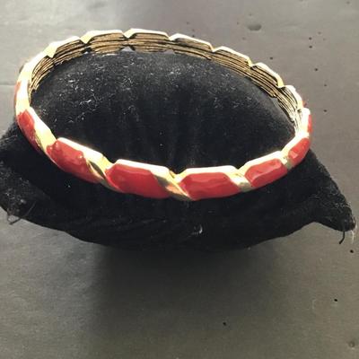 Sale Photo Thumbnail #22: Gold tone with red enamel bracelet. Please see attached photos.