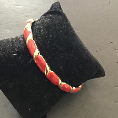 Sale Photo Thumbnail #21: Gold tone with red enamel bracelet. Please see attached photos.