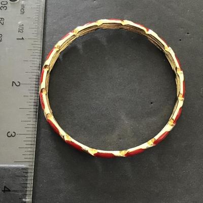 Sale Photo Thumbnail #23: Gold tone with red enamel bracelet. Please see attached photos.