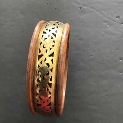 Sale Photo Thumbnail #52: Wooden and brass bangle. Please see attached photos.