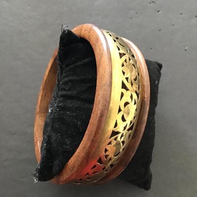 Sale Photo Thumbnail #50: Wooden and brass bangle. Please see attached photos.