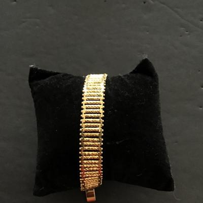 Sale Photo Thumbnail #55: very nice gold tone, fashion bracelet. Please see attached photos.