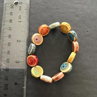 Sale Photo Thumbnail #72: very nice multicolored, ceramic stretchy bracelet. Please see attached photos.