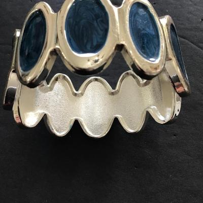 Sale Photo Thumbnail #95: Gold tone with blue enamel hinged bracelet. Please see attached photos.