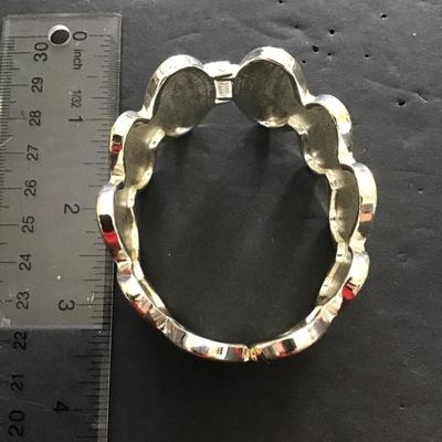 Sale Photo Thumbnail #96: Gold tone with blue enamel hinged bracelet. Please see attached photos.