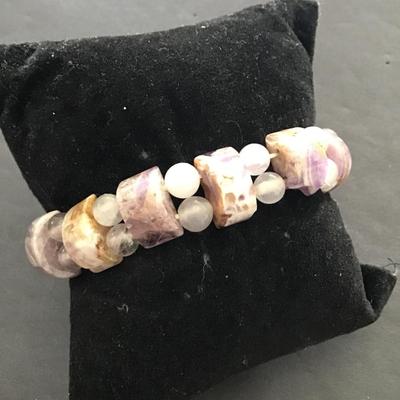 Sale Photo Thumbnail #111: Very nice polished stone stretchy bracelet. Please see attached photos.